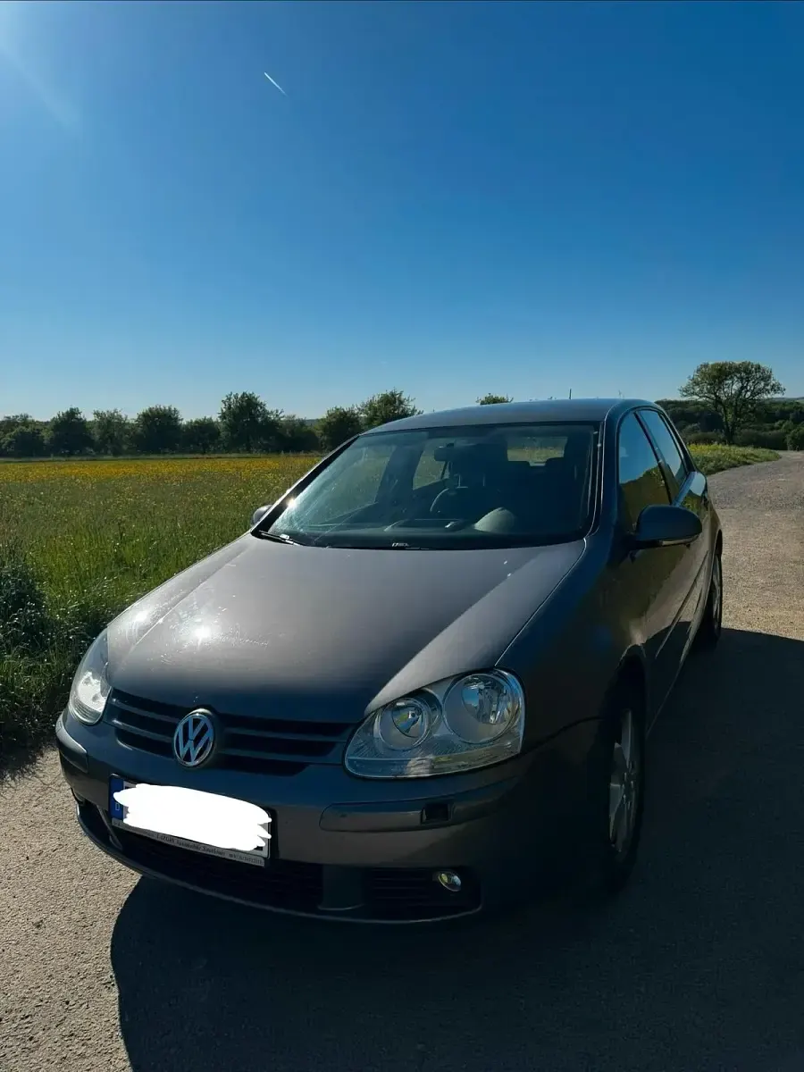 Second-hand VW Golf V 105 CP (77 kW) 2007 Alb Break
