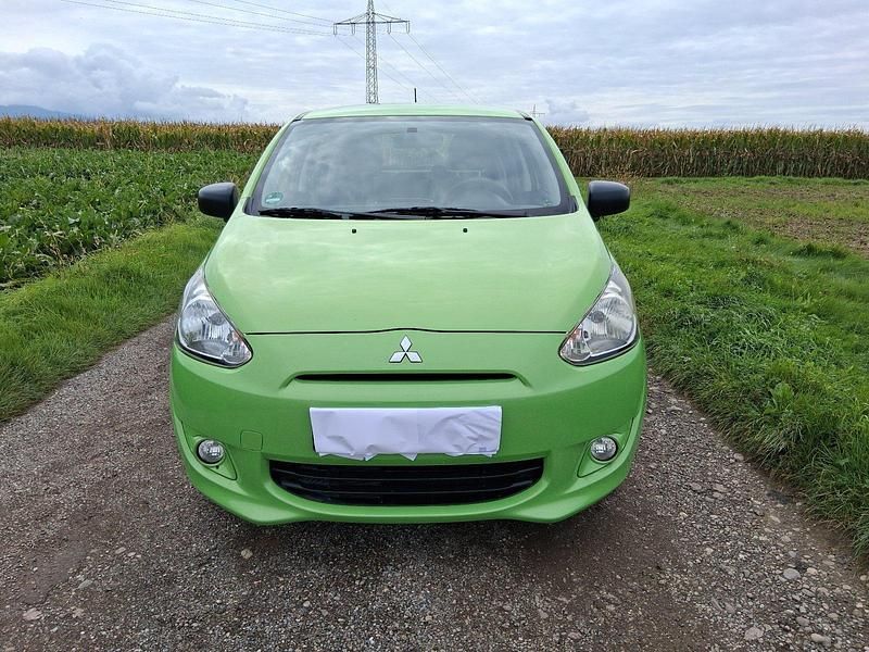 Grün Gebraucht 2015 Mitsubishi Space Star Kleinwagen | 5.200 € (Fairer Preis) - Bild 1/4