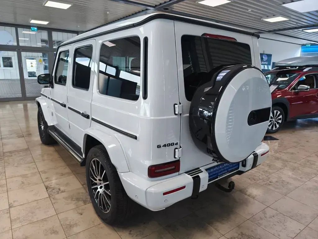 Gebraucht Mercedes G400 AMG line 330 PS (242 kW) 2023 G manufaktur opalithweiss brig SUV