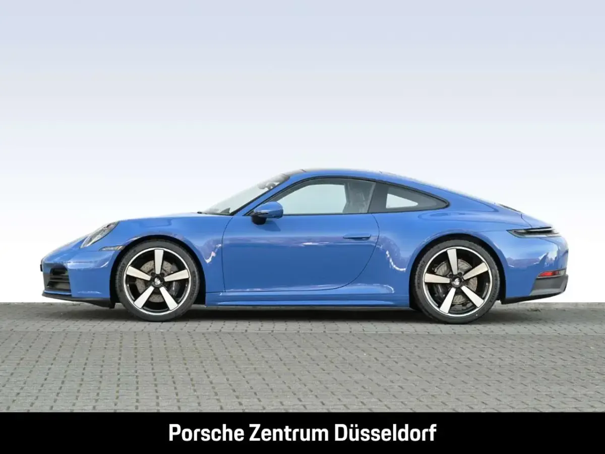 Gebraucht Porsche 911 Carrera 394 PS (289 kW) 2025 Luganoblau Coupé