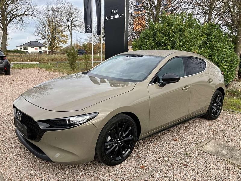 Zircon sand Neu 2025 Mazda 3 Homura-Line Limousine | 27.990 € - Bild 1/4