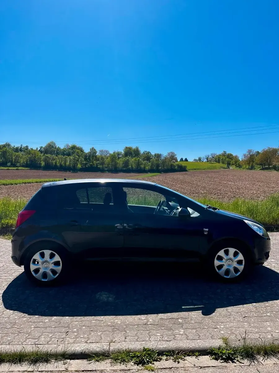 Gebraucht Opel Corsa Edition 86 PS (63 kW) 2010 Schwarz Kleinwagen