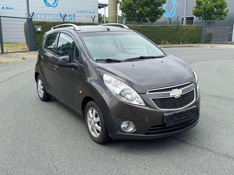Bronze Gebraucht 2011 Chevrolet Spark Kleinwagen | 3.399 € (Fairer Preis) - Bild 1/4