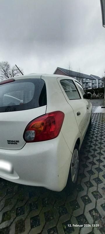 Gebraucht Mitsubishi Space Star 70 PS (51 kW) 2015 Weiß Limousine