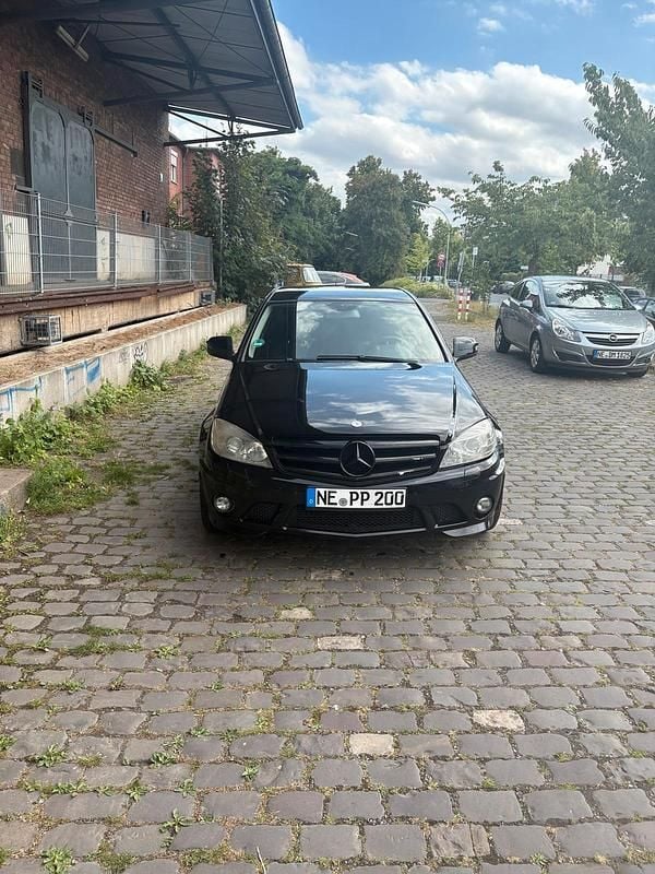 Schwarz Gebraucht 2007 Mercedes C63 AMG Limousine | 8.499 € - Bild 1/4
