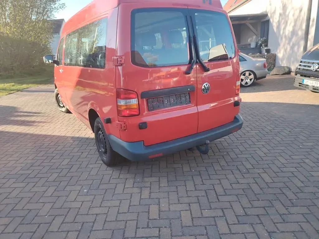 Używany VW T5 102 KM (75 kW) 2008 Czerwony Van