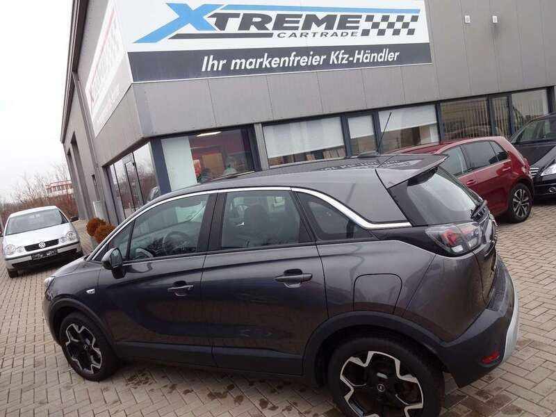 Mondstein grau/e:vulkan grau Gebraucht 2021 Opel Crossland X Elegance SUV | 13.790 € (Guter Preis) - Bild 1/4