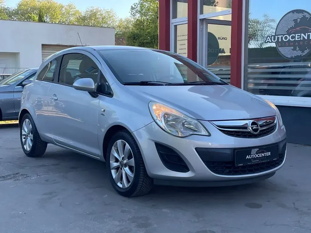 Second-hand Opel Corsa Active 87 CP (63 kW) 2013 Argintiu Hatchback