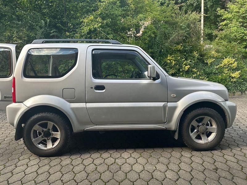 Silber Gebraucht 2008 Suzuki Jimny Club SUV | 12.900 € - Bild 1/4