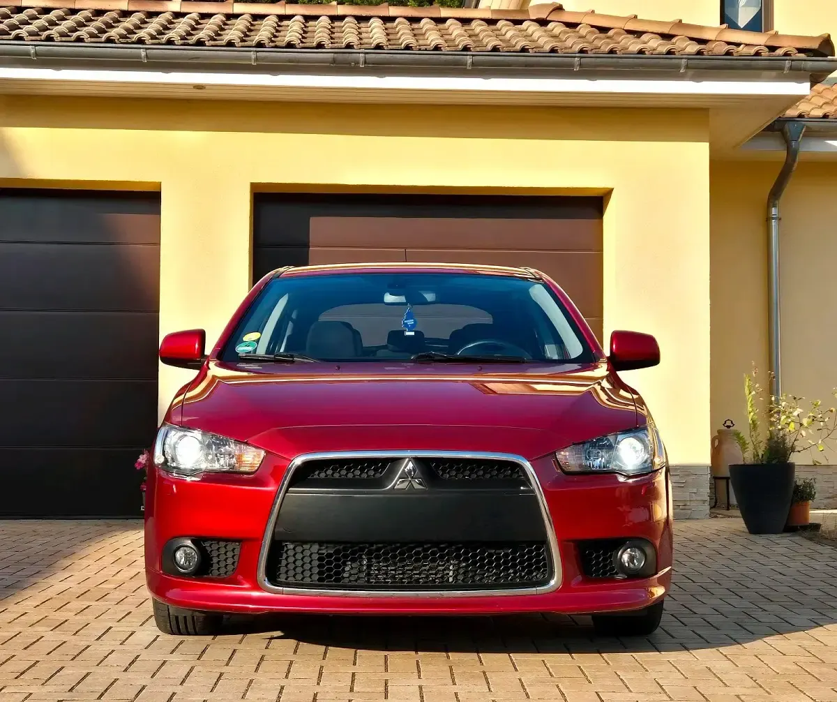 Gebraucht Mitsubishi Lancer Top 150 PS (110 kW) 2011 Rot Limousine