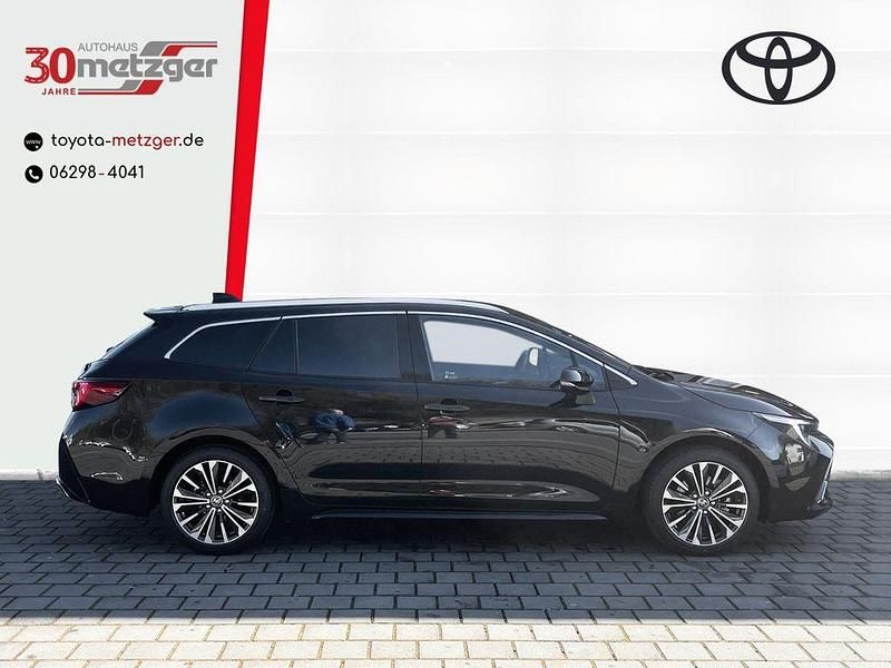 Gebraucht Toyota Corolla 196 PS (144 kW) 2024 Karminarot metallic Kombi