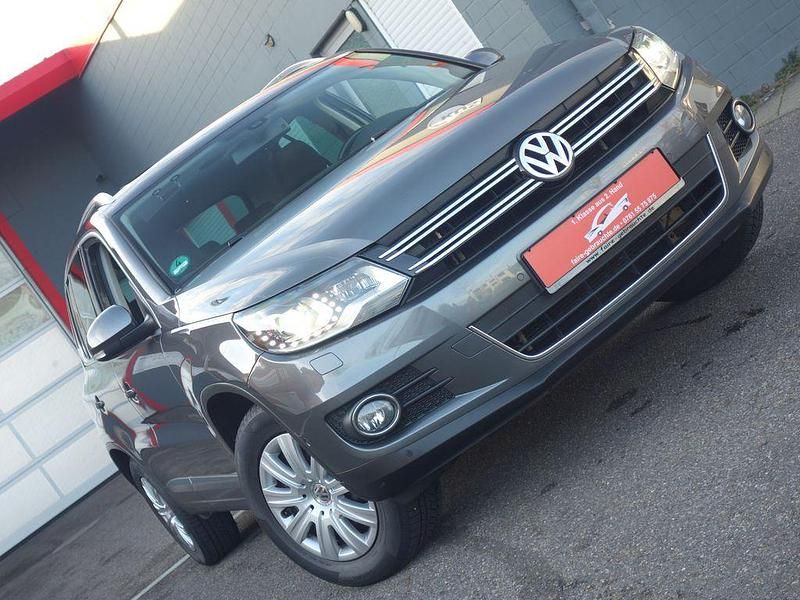 Grau Gebraucht 2012 VW Tiguan Sportline SUV | 11.000 € (Fairer Preis) - Bild 1/4