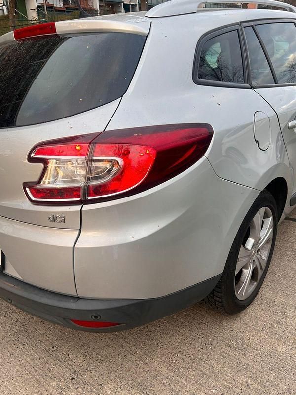 Używany Renault Mégane 106 KM (77 kW) 2012 Szary Sedan/Limuzyna