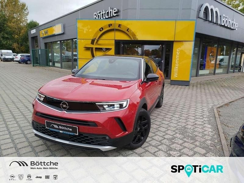 Lackierung rot rubi/typ aussenverkleidung metalliclackierung Gebraucht 2024 Opel Mokka-e Ultimate SUV | 23.990 € (Fairer Preis) - Bild 1/4