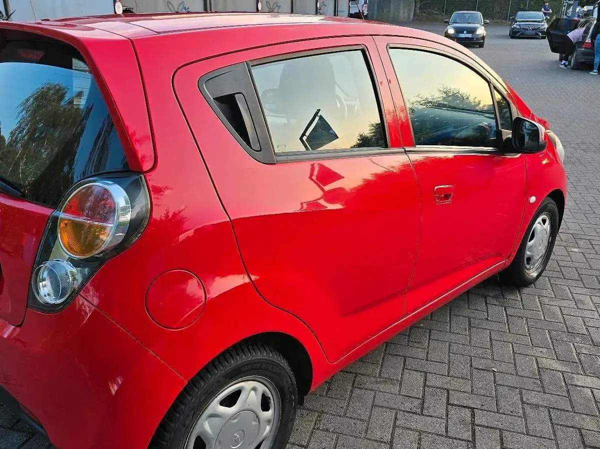 Gebraucht Chevrolet Spark 68 PS (50 kW) 2013 Rot Kleinwagen