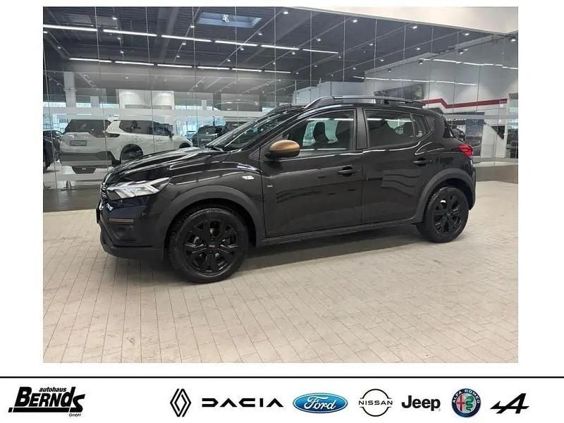 Perlmuttschwarz met. (676) (metallic) Gebraucht 2024 Dacia Sandero Extreme Kleinwagen | 17.880 € (Fairer Preis) - Bild 1/4