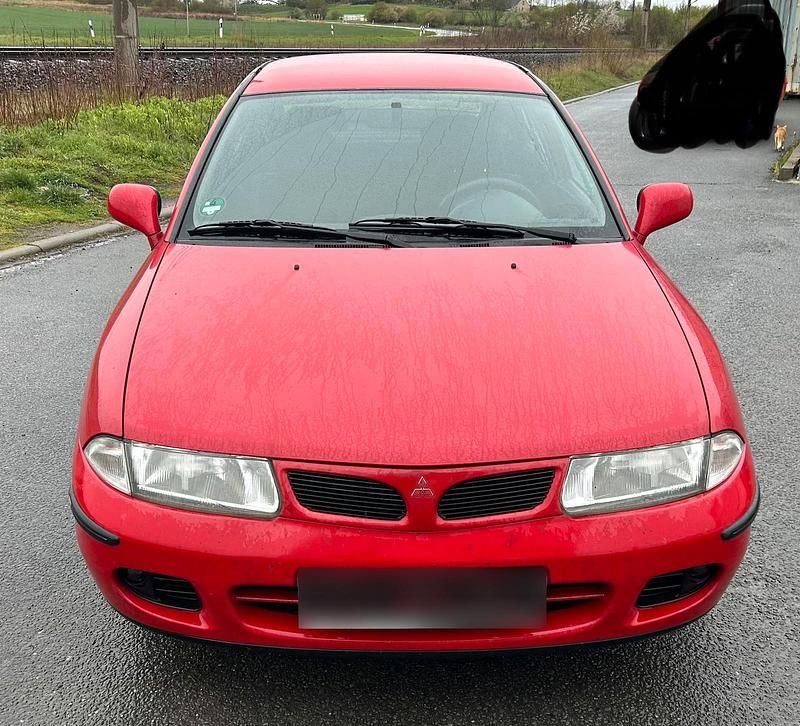 Gebraucht Mitsubishi Carisma 125 PS (91 kW) 1998 Rot Limousine