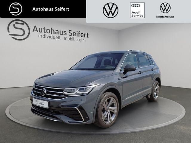 Grau Gebraucht 2020 VW Tiguan R-line SUV | 33.490 € (Etwas zu teuer) - Bild 1/4