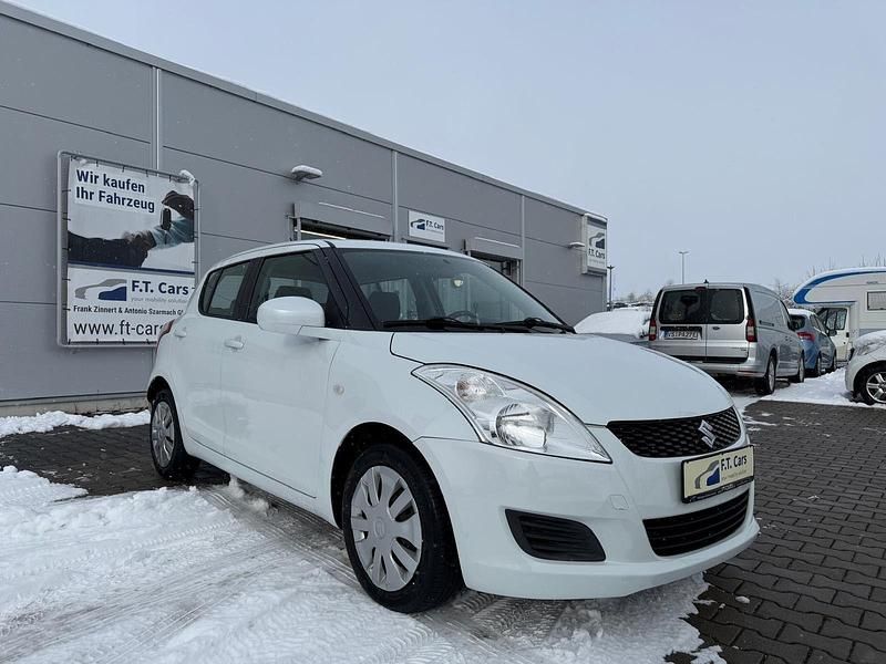 Weiß Gebraucht 2013 Suzuki Swift Club Kleinwagen | 4.980 € (Fairer Preis) - Bild 1/4