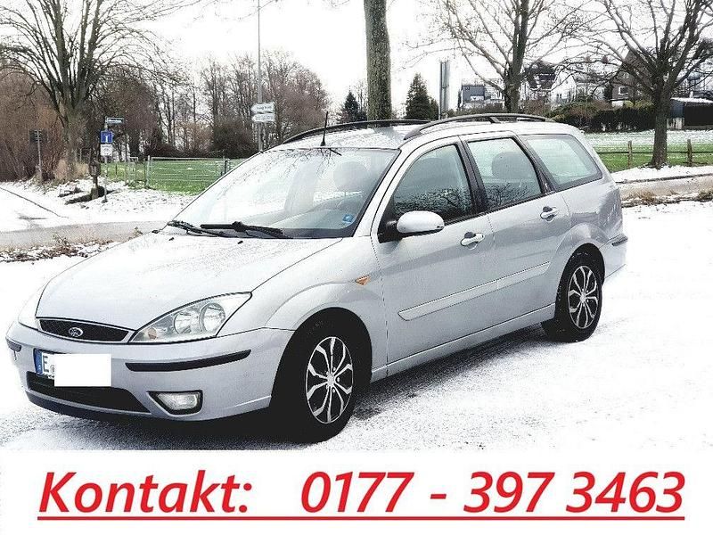 Grau Gebraucht 2006 Ford Focus Ghia Limousine | 1.599 € (Guter Preis) - Bild 1/4