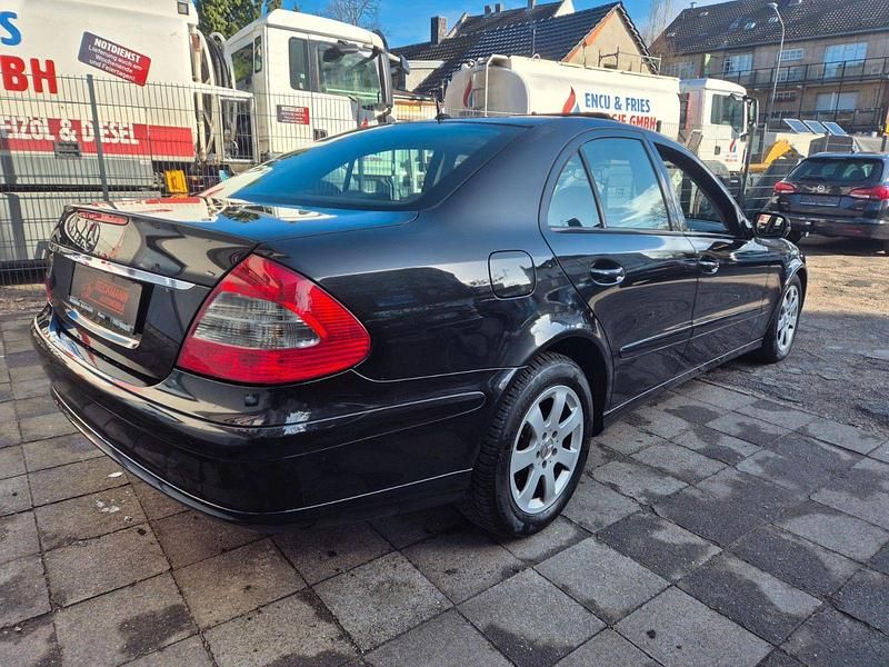 Second-hand Mercedes E200 184 CP (135 kW) 2007 Negru Berlinǎ