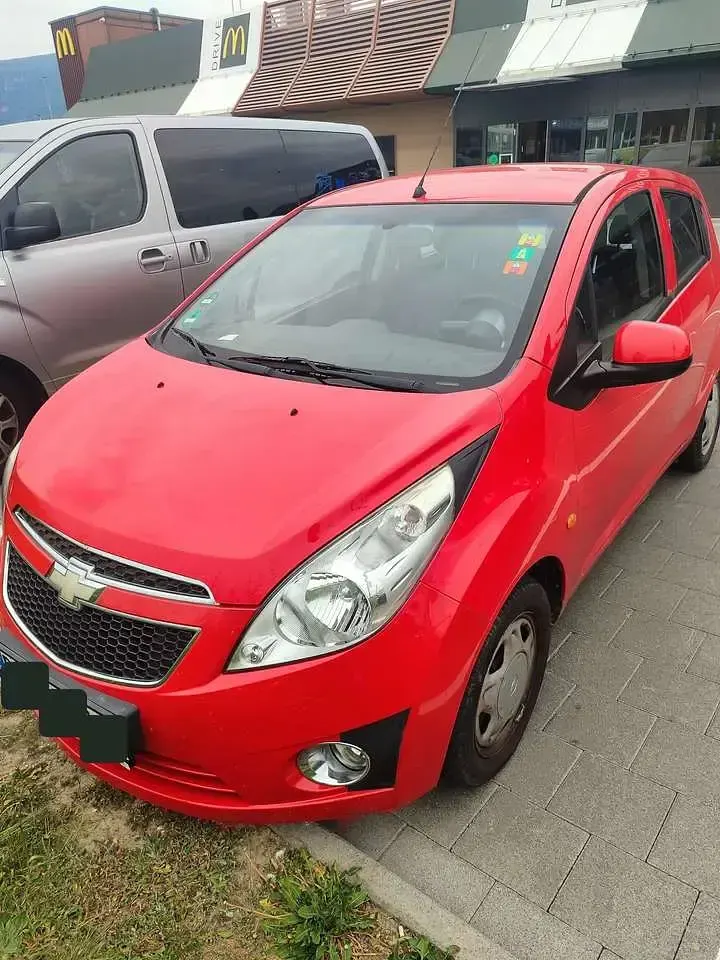 Second-hand Chevrolet Spark 68 CP (50 kW) 2011 Roșu Hatchback