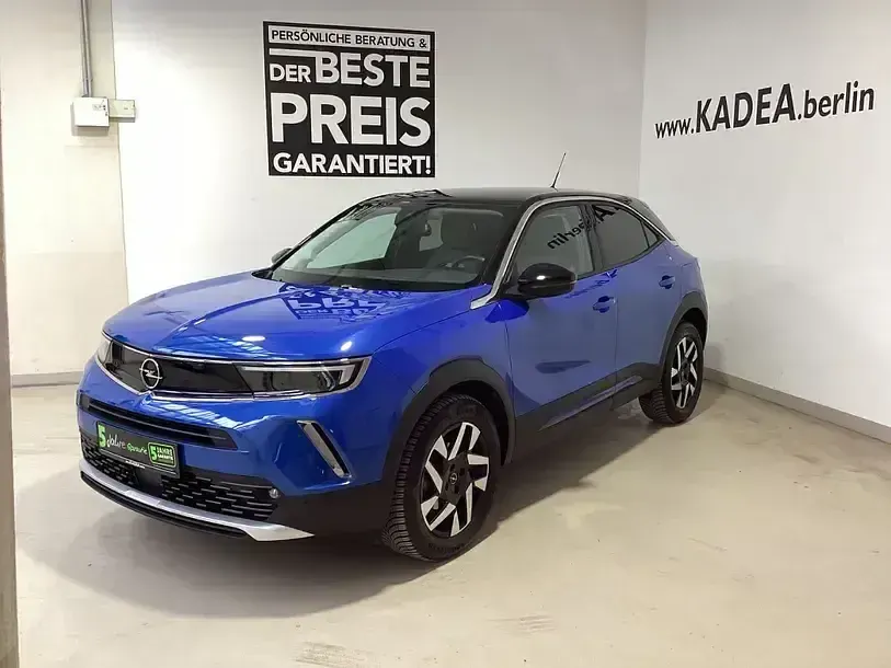 Gebraucht Opel Mokka 101 PS (74 kW) 2023 Perl blau/voltaik blau (metallic) SUV