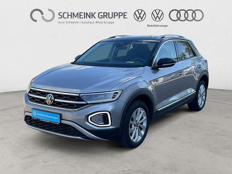 Pyritsilber metallic Gebraucht 2024 VW T-Roc Style SUV | 29.880 € (Fairer Preis) - Bild 1/4
