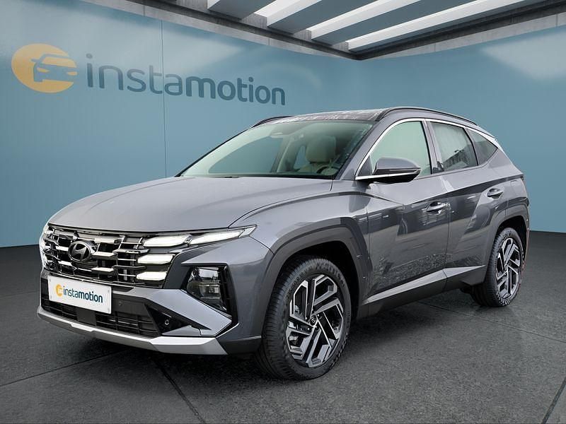 Grau Neu 2025 Hyundai Tucson Prime SUV | 37.849 € (Teuer) - Bild 1/4