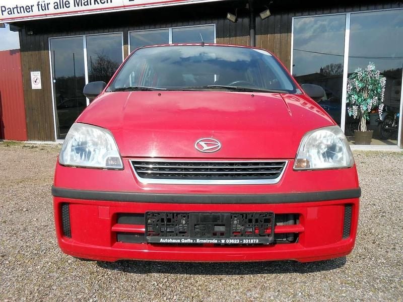 Gebraucht Daihatsu Cuore Plus 58 PS (42 kW) 2005 Purered Kleinwagen
