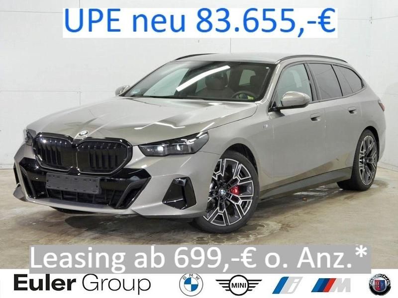 Grau Gebraucht 2024 BMW 520 Sport Line Kombi | 54.990 € (Fairer Preis) - Bild 1/4