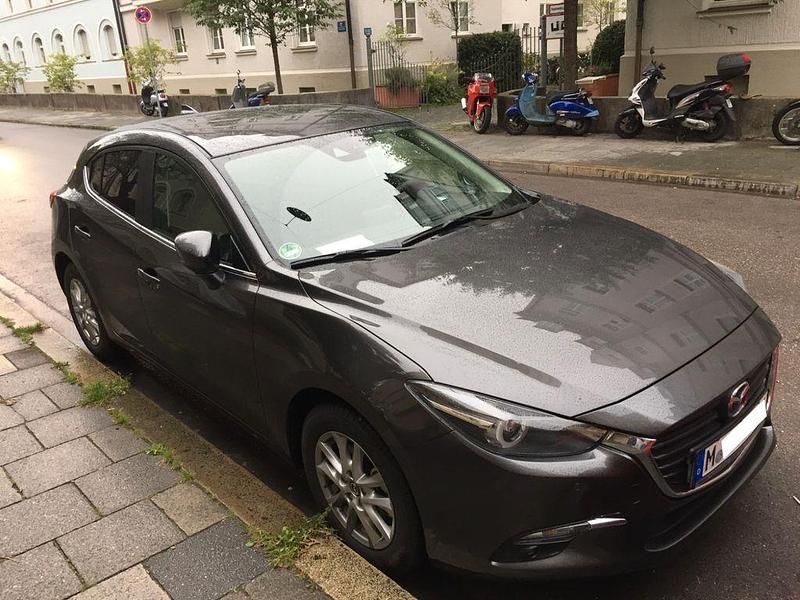 Grau Gebraucht 2017 Mazda 3 Exclusive-Line Limousine | 14.500 € (Fairer Preis) - Bild 1/4