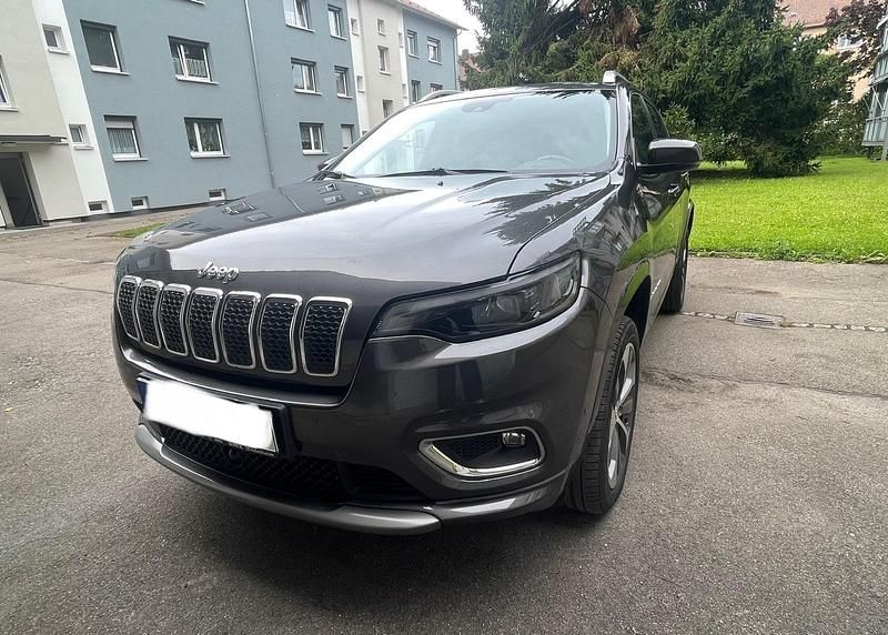 Grau Gebraucht 2021 Jeep Cherokee Overland SUV | 22.390 € - Bild 1/4