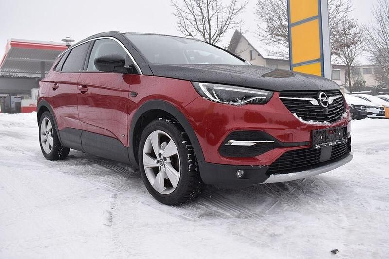 Bright red/dach schwarz (metallic) Gebraucht 2020 Opel Grandland X Ultimate SUV | 20.450 € (Fairer Preis) - Bild 1/4