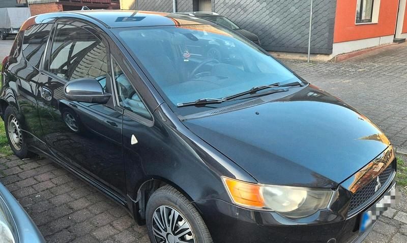 Gebraucht Mitsubishi Colt 70 PS (51 kW) 2010 Schwarz Kleinwagen