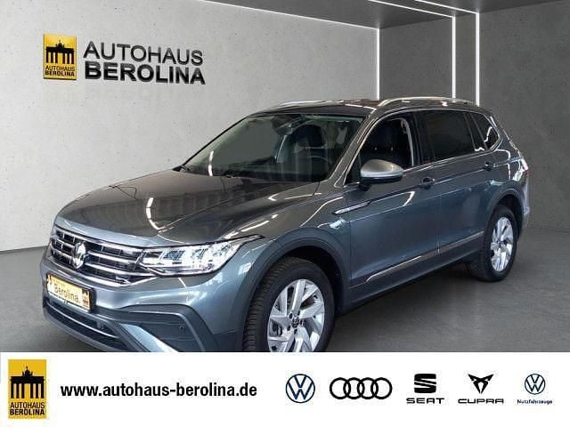 Grau Gebraucht 2024 VW Tiguan Allspace Life SUV | 38.888 € (Superpreis) - Bild 1/4