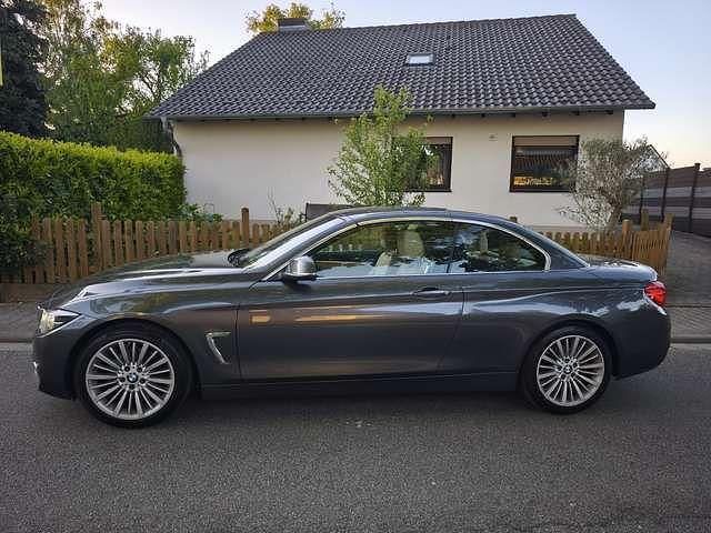 Grau Gebraucht 2017 BMW 420 Luxury Line Cabrio | 26.999 € (Teuer) - Bild 1/4