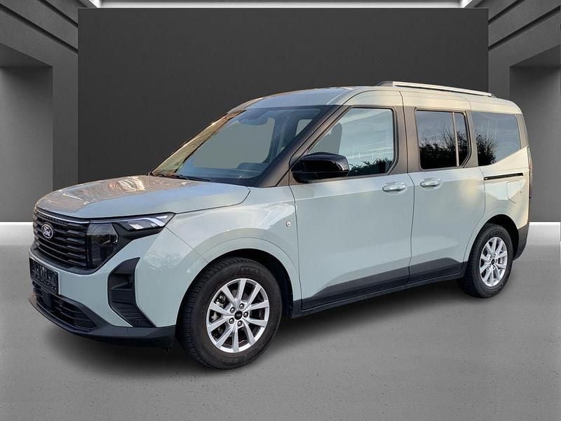 Grau Gebraucht 2023 Ford Tourneo Courier Titanium Van / Kleinbus | 20.647 € (Guter Preis) - Bild 1/4
