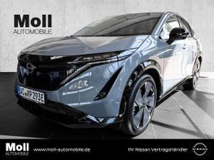 Grau ceramic grey Gebraucht 2024 Nissan Ariya Evolve SUV | 49.900 € (Etwas zu teuer) - Bild 1/4