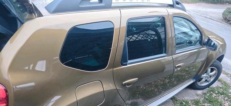 Second-hand Dacia Duster 109 CP (80 kW) 2016 Verde SUV