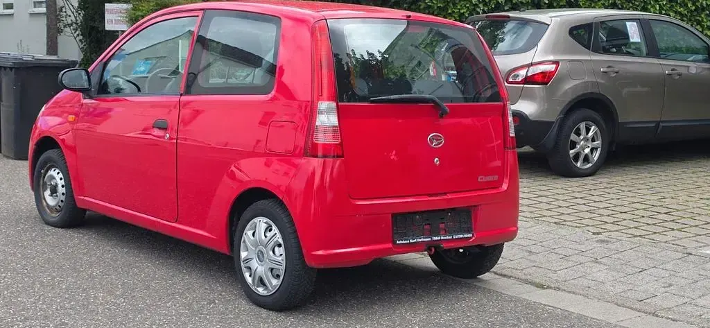 Gebraucht Daihatsu Cuore 58 PS (42 kW) 2005 Rot Kleinwagen