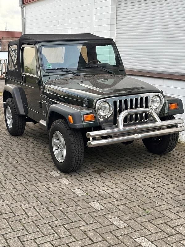 Grün Gebraucht 1998 Jeep Wrangler SUV | 7.490 € (Superpreis) - Bild 1/4
