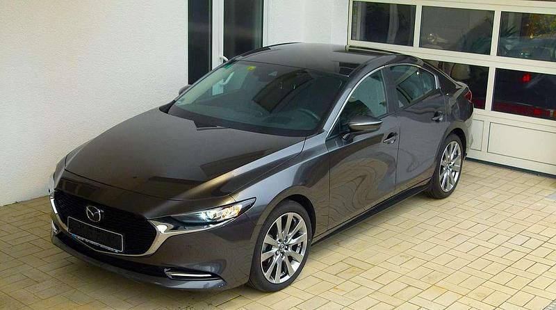Machine grey Gebraucht 2020 Mazda 3 Limousine | 21.950 € (Fairer Preis) - Bild 1/4