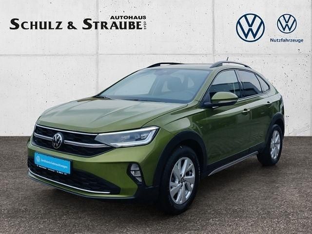 Visual green metallic (metallic) Gebraucht 2022 VW Taigo Life SUV | 19.950 € (Guter Preis) - Bild 1/4