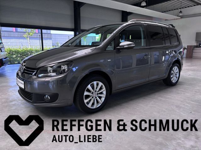 Grau (pepper grey) Gebraucht 2014 VW Touran Cup Van / Kleinbus | 20.940 € - Bild 1/4