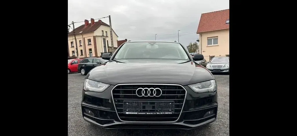 Używany Audi A4 Ambition 177 KM (130 kW) 2014 Czarny Kombi