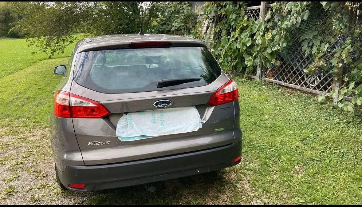 Używany Ford Focus 125 KM (91 kW) 2014 Szary Kombi