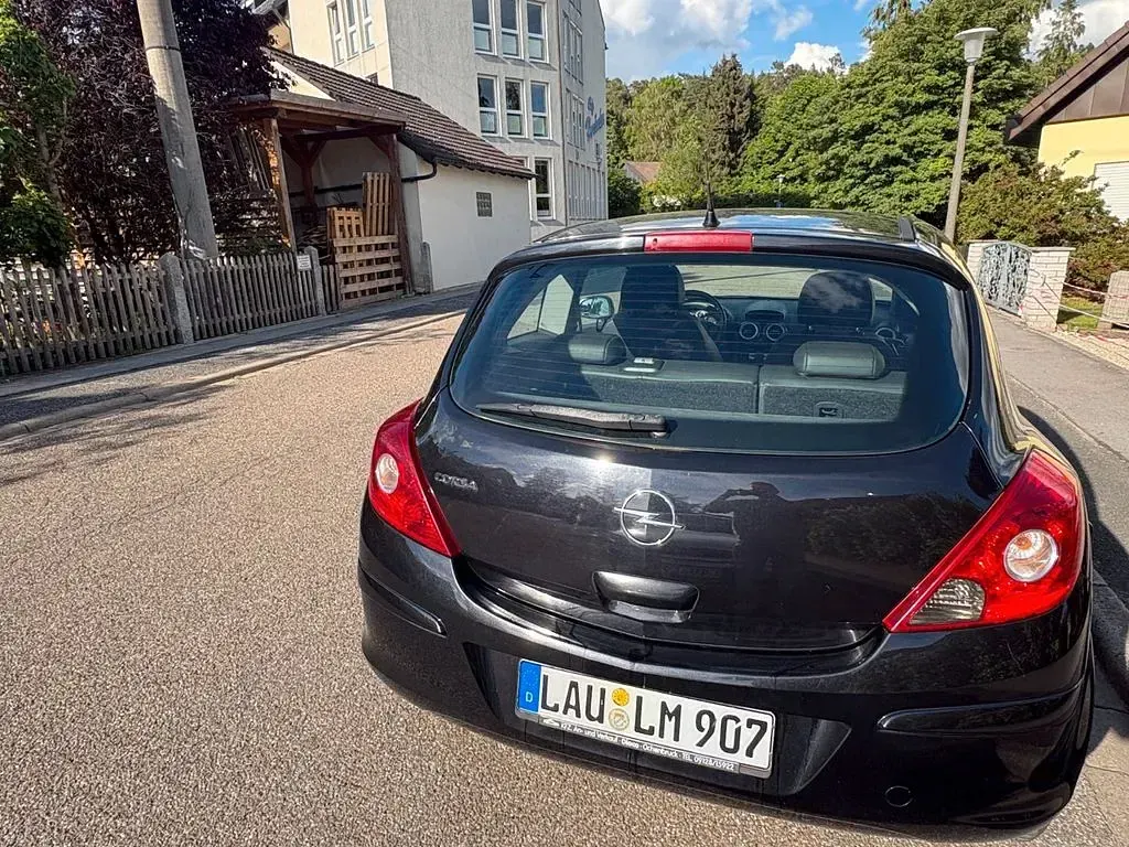 Używany Opel Corsa 80 KM (58 kW) 2009 Czarny Hatchback