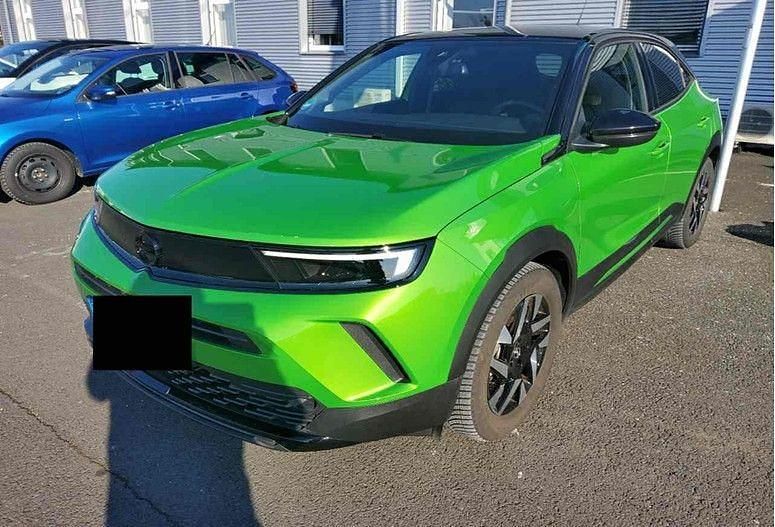 Grün Gebraucht 2023 Opel Mokka-e SUV | 18.450 € (Superpreis) - Bild 1/4