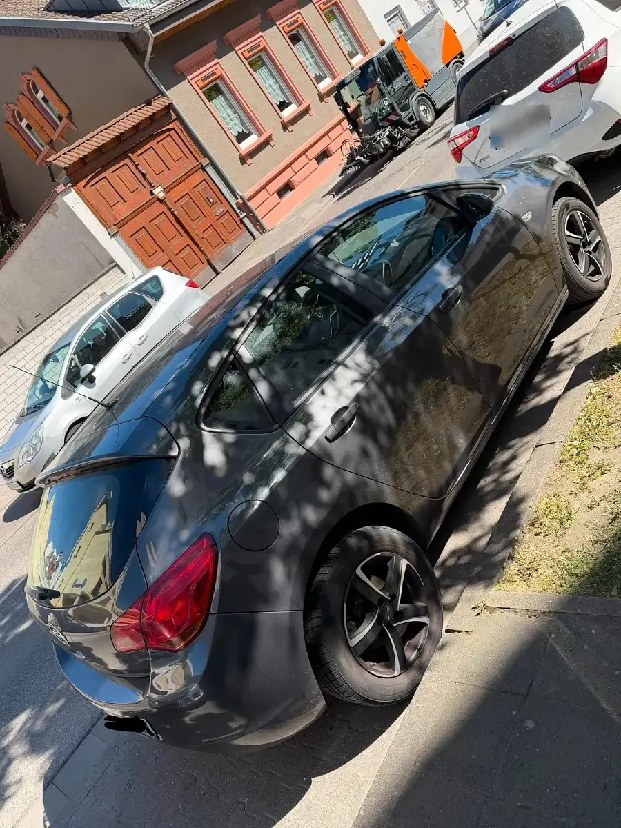 Gebraucht Opel Astra 120 PS (88 kW) 2011 Grau Coupé